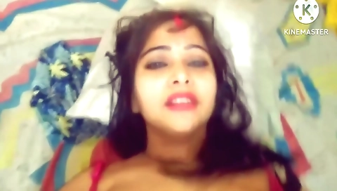 Amateur brunette in a red dress and stockings enjoys sex