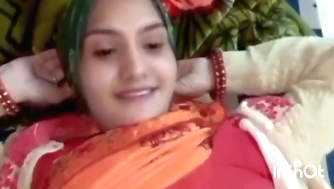 Indian woman in green dress and stockings is playing