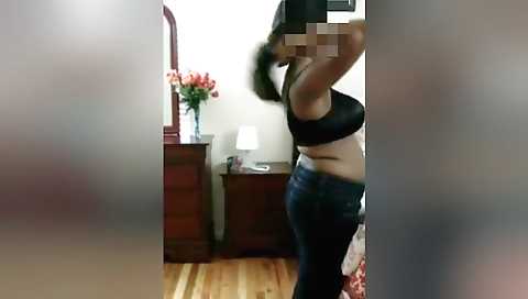 Indian brunette in a red dress showing her big boobs