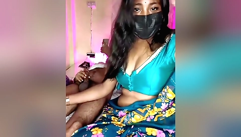 Indian brunette masturbates on the couch and sucks her lover's dick