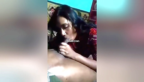 Wife is giving a blow job in front of amateur webcam