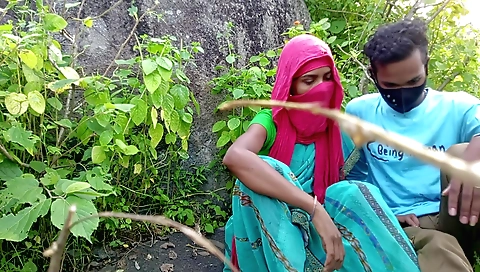 Girl in clothes enjoys outdoor lovemaking in forest