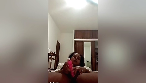 Big tits brunette with big pussy rides a big toy on webcam