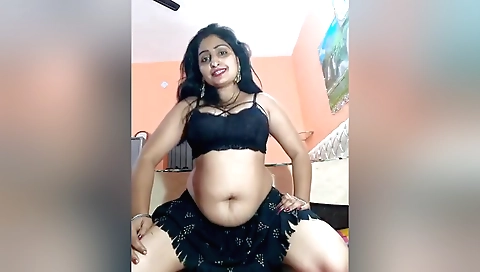 Hot brunette shows off her ass and tits on a solo video
