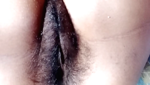Busty girl shows her nice hairy pussy in homemade video