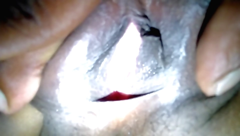 Indian brunette amateur with small tits giving a blowjob
