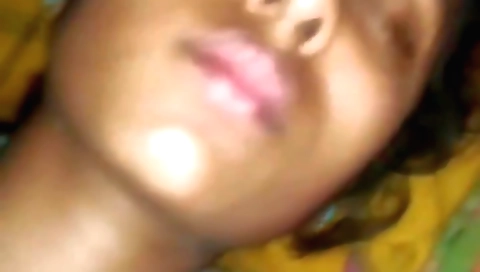 Gorgeous brunette girl takes a peek at a porn video