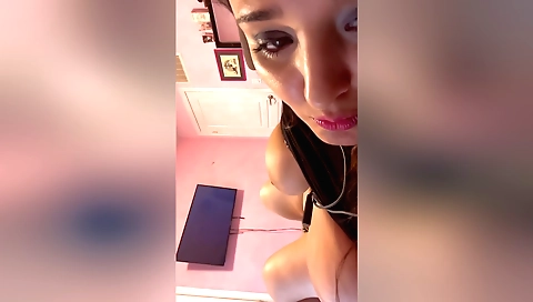 Horny brunette solo girl sucking a dildo with her hands