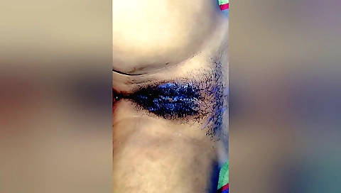Indian girl with hairy pussy enjoys shower and suck water
