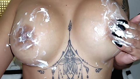 Busty girl with tattooed pussy has a really tight pussy