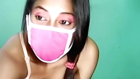 Indian brunette girl plays with her small tits and tits