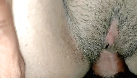Indian girlfriend talks a little with her friend in the bedroom