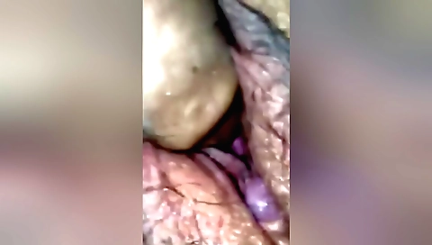Indian brunette girl with a shaved pussy licking cocks