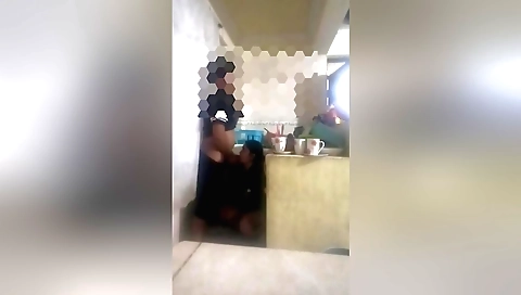 Amateur brunette lady is getting fucked in the kitchen