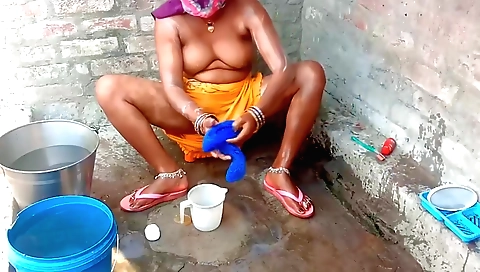 Sexy Indian girl strips naked and fucks in the shower