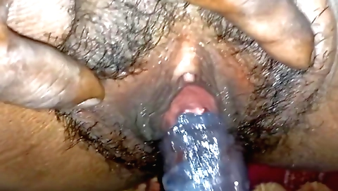 Amateur fetish hussy strips naked and fingers hairy bush