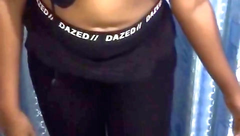 Solo video of hot brunette naked in leather shorts