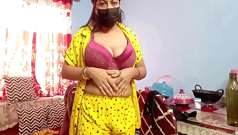 Indian woman changing her pink saree and is getting hot