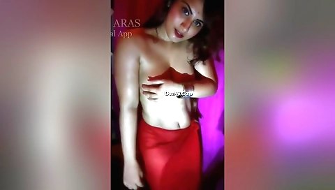 Sexy brunette in a sexy big tits hairdressing outfit
