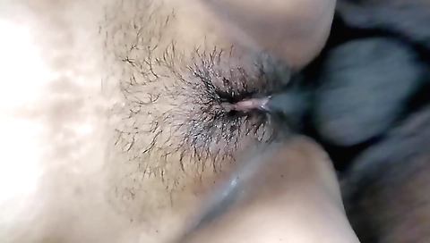 Indian hairy babe with a sexy dress shows off her hairy pussy