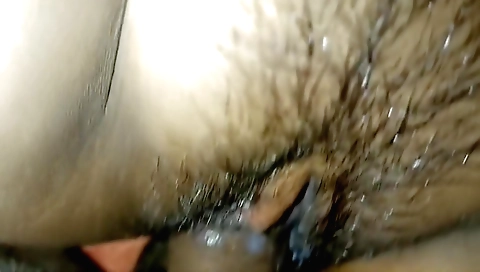 Indian teen with a hairy pussy is getting off on a video clip